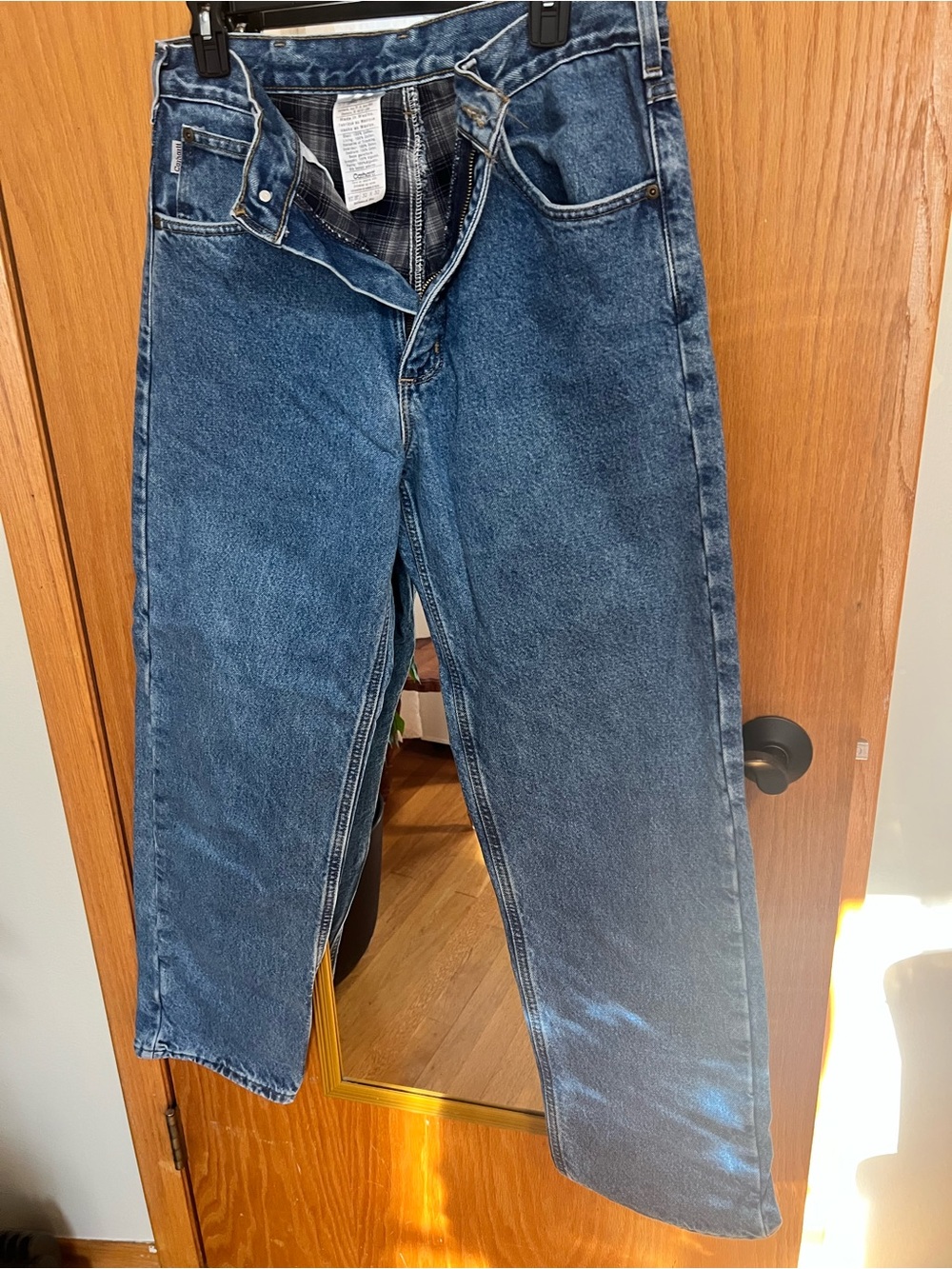 Carhartt Men's Straight Leg Jeans in Blue Denim flannel lined.